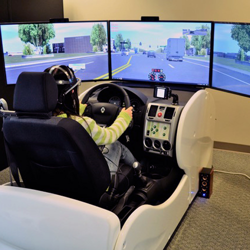 Human subject using the driving simulator at Purdue University