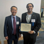 Richard Ajagu with Henry Liu at the CUTC Winter Banquet