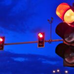 A set of traffic signals showing solid red