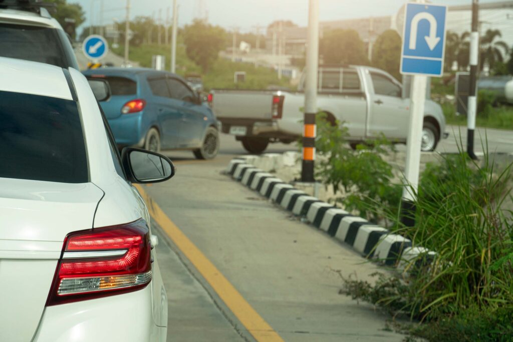 Back of vehicles as they make a U-turn