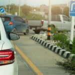 Back of vehicles as they make a U-turn