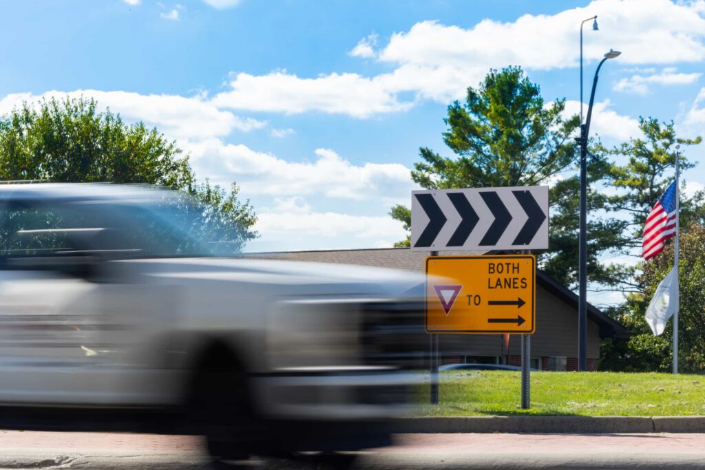 A truck moves through a roundabout